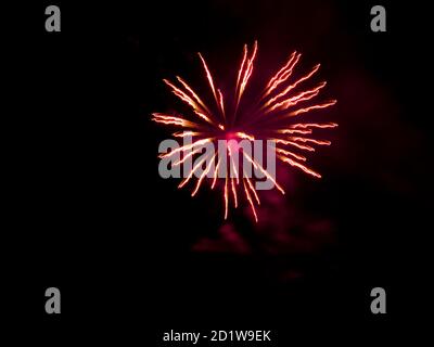 Burning sparklers on black background. Small fireworks giving off sparks of fire. Sparks explosion. During Armada exhibition in France Stock Photo