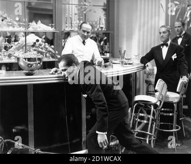 HUMPHREY BOGART dying in ANGELS WITH DIRTY FACES 1938 director MICHAEL CURTIZ Warner Bros. Stock Photo