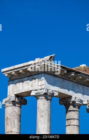 Corner detail of the Ionic capitals on the surviving columns of the Temple of Saturn, Roman Forum, Rome, Italy. Rebuilt 42 BC. Stock Photo