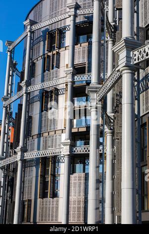 Exterior view of contemporary flats and penthouses built inside Grade II-listed Victorian gasholder frames, St Pancras Lock, King's Cross, London, UK. Stock Photo