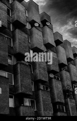 Exterior view of a Brutalist tenement house in the Center district of Warsaw, Poland. Stock Photo