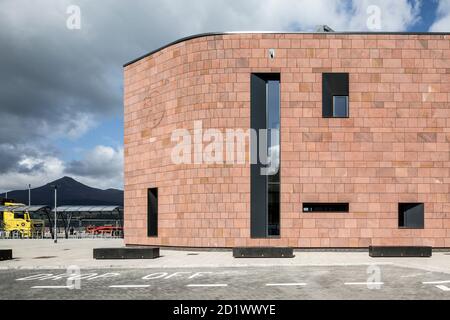 Facade of Brodick Ferry Terminal, clad in red sandstone, Isle of Arran, Scotland, UK. Stock Photo