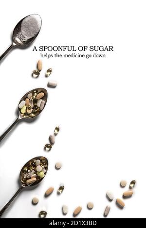 Spoons full of medication and pills and sugar - a spoonful of sugar heps the medicine go down Stock Photo