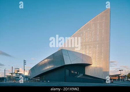 Imperial War Museum North, which represents a shattered globe, was the first building in the UK by Daniel Libeskind. Built on a bomb site, it was completed in 2002 in Salford Quays, Manchester, England, UK. Stock Photo