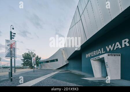 Imperial War Museum North, which represents a shattered globe, was the first building in the UK by Daniel Libeskind. Built on a bomb site, it was completed in 2002 in Salford Quays, Manchester, England, UK. Stock Photo