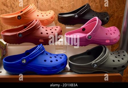 FRESNO, UNITED STATES - Sep 01, 2020: A top photo of 6 Crocs on a store  shelf in different colors in Blue, Black, Orange, Pink and Red Stock Photo  - Alamy