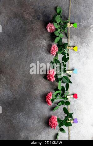Envelope with heart hanging with clothespins on rope string peg. Letter ...