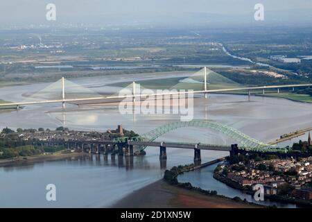 An aerial view of the Mersey Estuary and the Runcorn bridges, new and old, North West England, UK