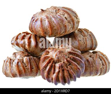 Heap of freshly baked brown eclairs isolated on a white background. Stock Photo