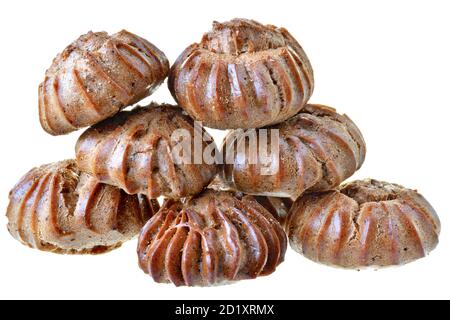 Heap of freshly baked brown eclairs isolated on a white background. Stock Photo