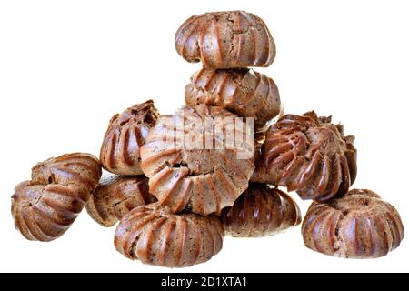 Heap of freshly baked brown eclairs isolated on a white background. Stock Photo