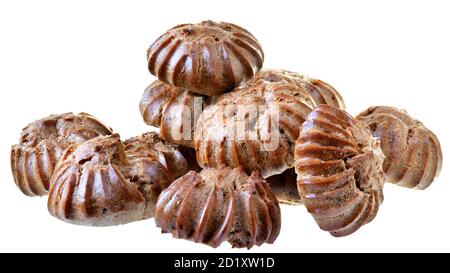 Heap of freshly baked brown eclairs isolated on a white background. Stock Photo