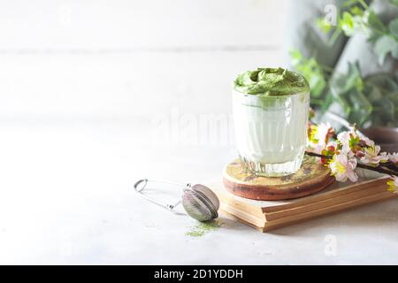 Match Dalgona Latte, Match cream, on a white background. Matcha green tea. Stock Photo