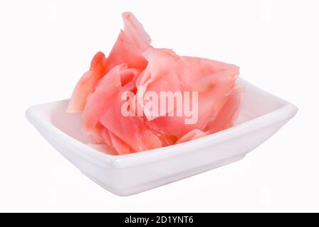 Pickled ginger in a white plate on a white background Stock Photo