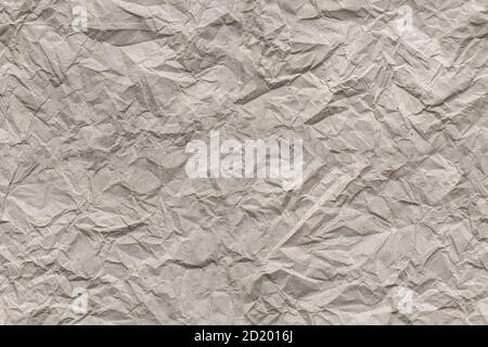 Seamless background of beige creased paper, vintage wrinkled paper texture, copy space Stock Photo