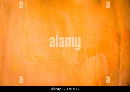 Orange painted on paper background texture Stock Photo