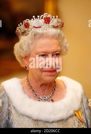 Britain's Queen Elizabeth attends a reception before a dinner at Brdo Castle October 21, 2008. Queen Elizabeth and Prince Philip are on a two-day official visit to Slovenia. REUTERS/Srdjan Zivulovic (SLOVENIA)