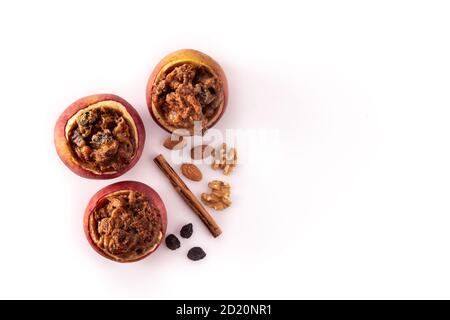 Stuffed apples baked with nuts isolated on white background Stock Photo
