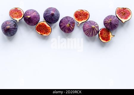 Flat lay of figs on a kitchen table, top view Stock Photo