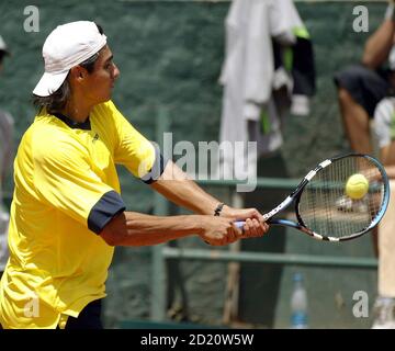 Periodic Dignified Infant Nicolas Lapentti of Ecuador returns a backhand to Galo Blanco of Spain  during their semifinal match at the Austrian Tennis Open in Kitzbuehel on  July 28, 2001. Lapentti won the match 6-2