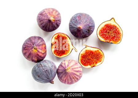 Pattern of whole and sliced figs. Overhead view Stock Photo