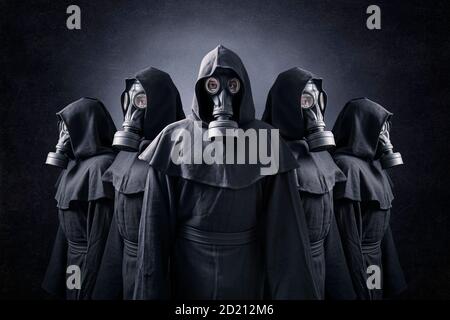 Group Of Five Scary Figures In Hooded Cloaks In The Dark Stock Photo -  Download Image Now - iStock