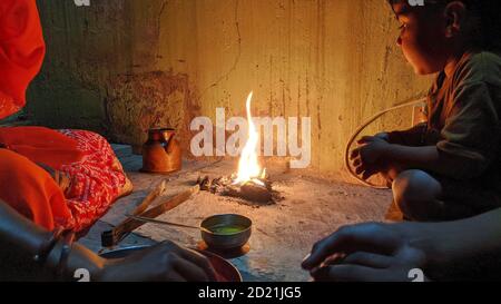 29 September 2020 : Reengus, Jaipur, India : A ritual of sacrifice made to the fire god Agni. Stock Photo