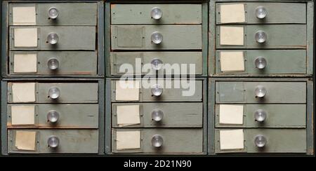Backgrounds and textures: old wooden cabinet with drawers, front view, close-up shot Stock Photo