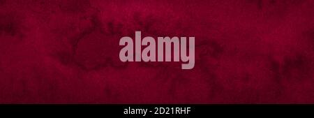 Intense burgundy color of hand-painted watercolor stains. Dark red abstract background with natural texture. Stock Photo