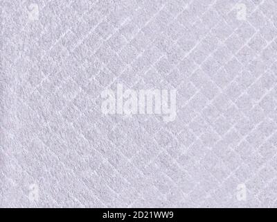 Texture of wool felt material. Soft cloth with pile, textiles rhombus. Background of rhombic felt fabric. Stock Photo