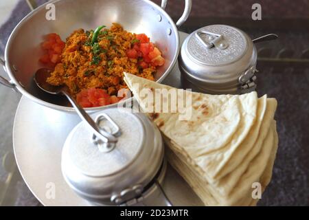 Bahrain breakfast of eggs, tomatoes, chillies and flat bread, the restaurant, National Museum of Bahrain Stock Photo