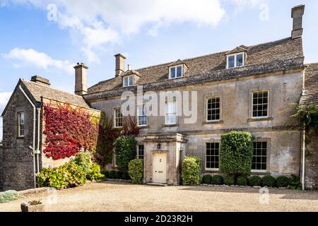18th century ashlar fronted Miserden House in the Cotswold village of Miserden, Gloucestershire UK Stock Photo