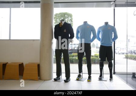 MCFC Academy  Academy Uniforms and standards of dress on display in the academy Foyer. Stock Photo