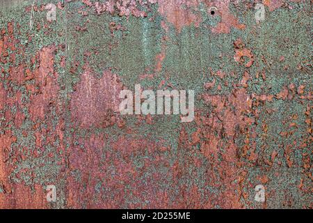 Green and orange rusting decaying metal texture Stock Photo