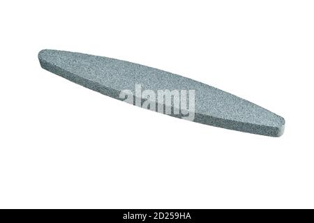 Sharpening stone. Grindstone or whetstone sharpener, isolated on white background. Kitchen utensils Stock Photo