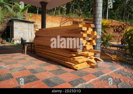 Furniture, doors, windows frame, and tables at factory. Wood cutting for making a door frame, window frame for using in building houses, business. Cut Stock Photo