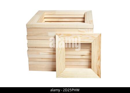 Heap square wooden stretcher bar frames on white background, isolated. Frame for stretching artistic canvas. Product for professional artists and amat Stock Photo