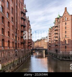 The iconic Speicherstadt (City of Warehouses) in Hamburg, Germany. Located within the HafenCity quarter. Built from 1883 to 1927. Stock Photo