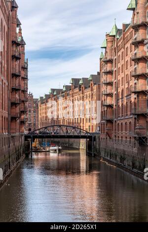 The iconic Speicherstadt (City of Warehouses) in Hamburg, Germany. Located within the HafenCity quarter. Built from 1883 to 1927. Stock Photo