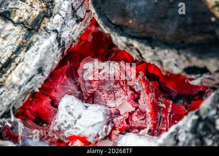 Smoldering embers of burning wood, closeup in details Stock Photo