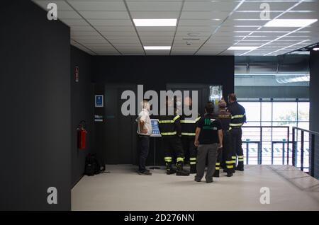 Trieste, Italy - September, 06: Firefighters checking security system during the ESOF, Euroscience open forum in Trieste on September 06, 2020 Stock Photo