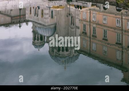 Reflections of buildings (Serbian Orthodox church of Saint Spyridon) in the Grand Canal, Trieste, Friuli Venezia Giulia, Italy Stock Photo