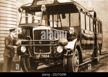 Magazine photograph from 1931 -  Showing the newly introduced   'Road-Rail Car',  actually a public bus with 2 sets of wheels allowing it to run on the roads or on railway lines. The dual mode vehicles are sometimes known as guided buses, hi-rail, (from highway and railway),   high-rail, HiRail, Hy-rail, etc Stock Photo
