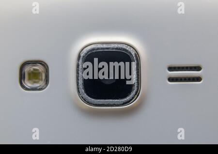 close-up shot of mobile phone camera lens and flash with white background Stock Photo