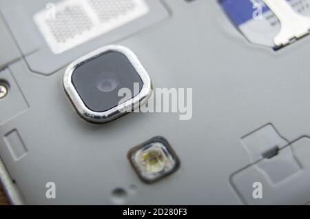 Close up view of camera inside smartphone and motherboard Horizontal Stock Photo