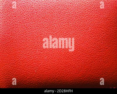 red leather , pink leather or orange leather texture background.  cow skin or snake skin used for leather. Stock Photo