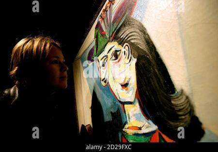 Poni Ujlaky Of Hungary Enjoys A Close Up Look At A Portrait By Pablo Picasso Entitled Dora Maar Au Chat At Sotherby S In London March 22 06 The Canvas Painted In 1941 Is