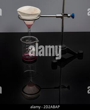 Filter paper in laboratory. Scientists are chemical filtration by ...