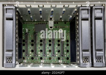 Storage area networking, cluster of raid hard drives. Close-up rack-mounted without disk array server Stock Photo