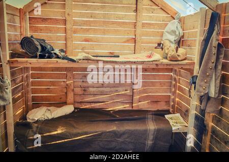 Military life during the civil war in the United States. Mobile barracks of American soldiers in the 19th century. Tent with beds in the camp. Stock Photo